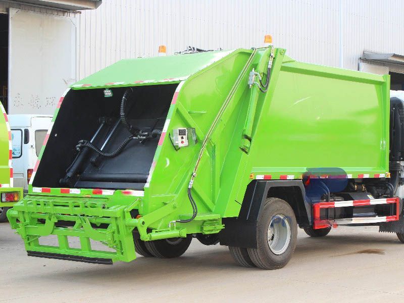 Qingling ELF 8cbm waste compactor refuse truck