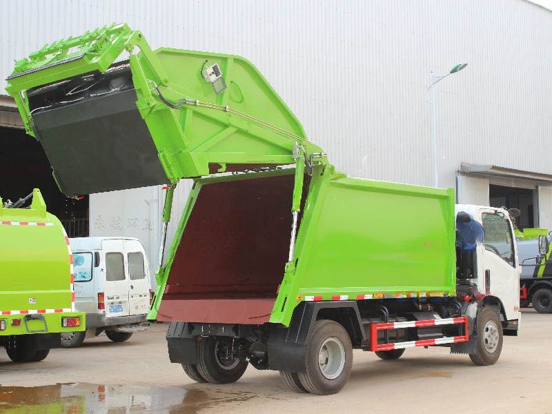 Qingling ELF 8cbm waste compactor refuse truck