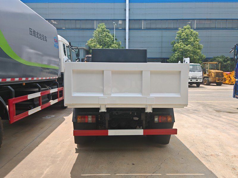 Isuzu KV100 NKR dump truck for transporting cement and river sand