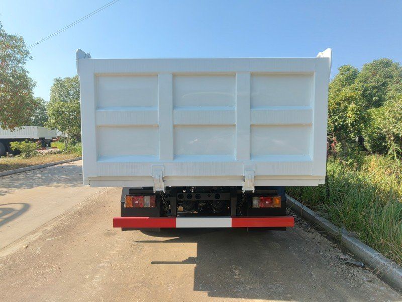 Isuzu KV100 NKR dump truck for transporting cement and river sand